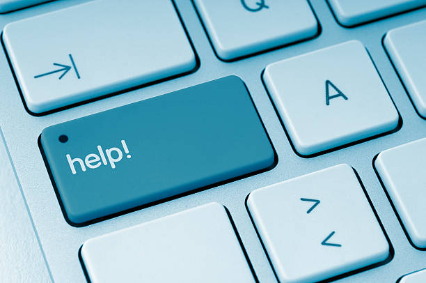 Close-up of a blue keyboard help key, representing always-on support